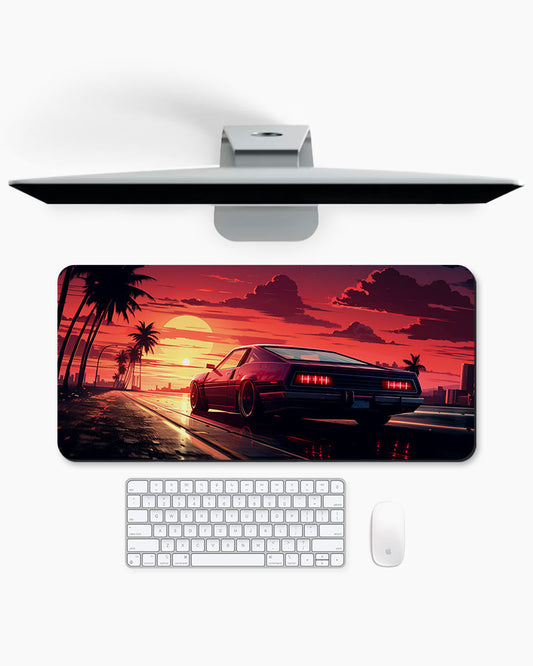 Arafed Car Driving Road With Palm Trees Desk Mat