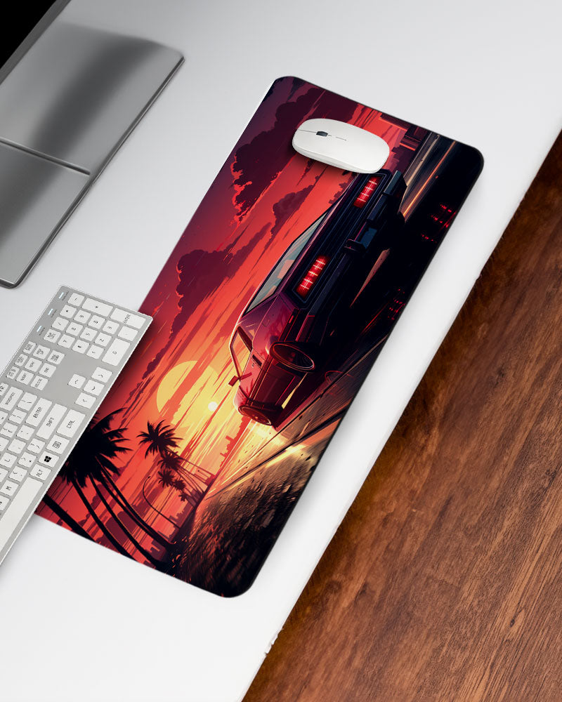 Arafed Car Driving Road With Palm Trees Desk Mat