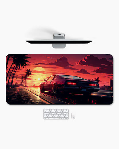 Arafed Car Driving Road With Palm Trees Desk Mat