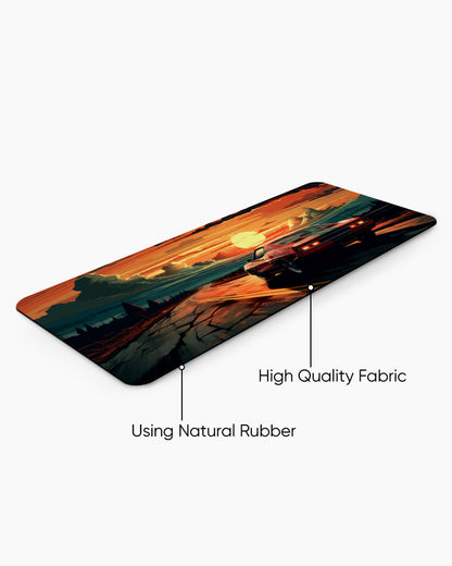 Race Car Racing Down Track Into Sunset Desk Mat